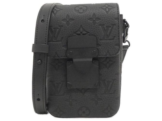 Portefeuille vertical Louis Vuitton Taurillon Monogram S-Lock Noir