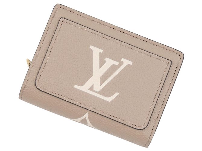 Cartera bi-fold Louis Vuitton en Monogram Empreinte Gris Crudo