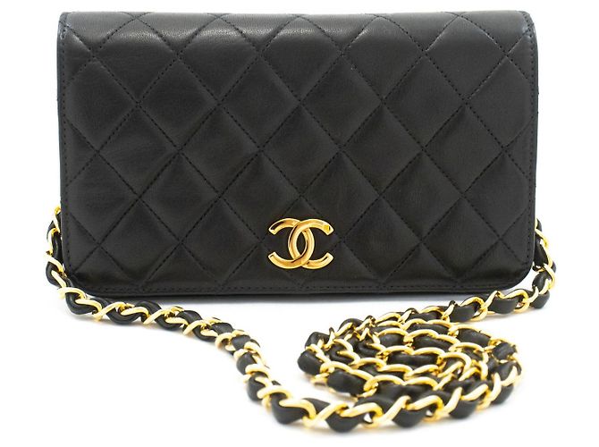 Chanel Vintage Mini in pelle d'agnello matelassé con patta completa Nero