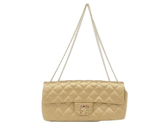 Sac à épaule Chanel 37632 en satin doré