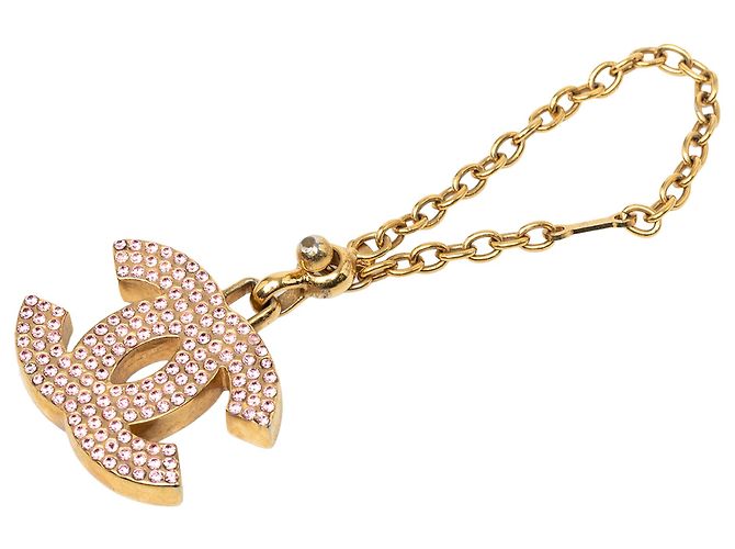 Amuleto de bolso Chanel Gold CC chapado en oro y strass Dorado