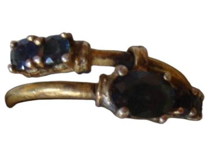 Autre Marque Bague ouverte en or jaune et saphirs Bleu Doré