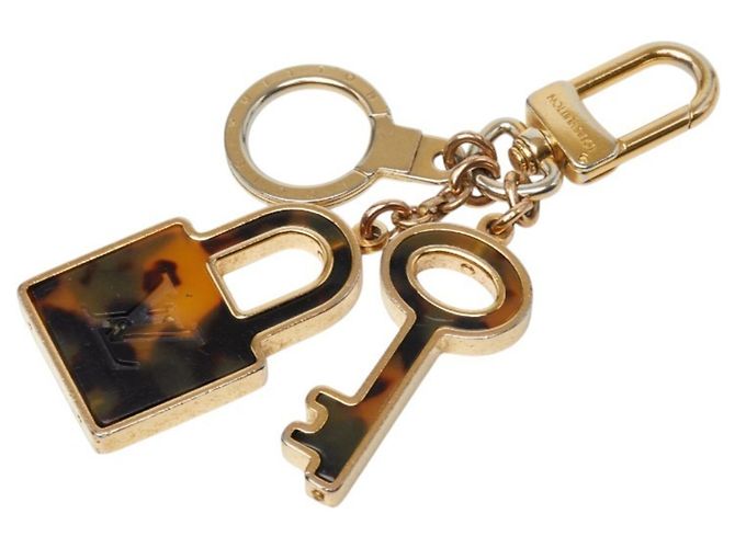 Louis Vuitton Portefeuille Confidence Keychain Marrone D'oro