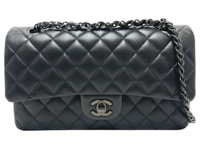 Borsa a tracolla Chanel A01112 Matelassé Nero