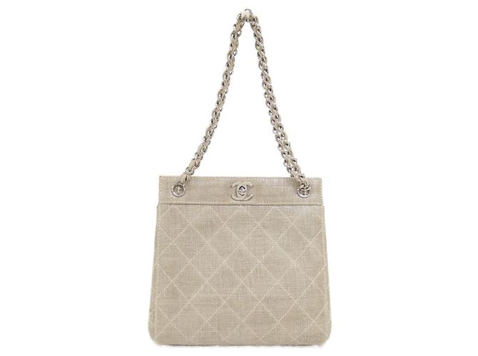 Bolsa Chanel de linho bege com ferragens prateadas
