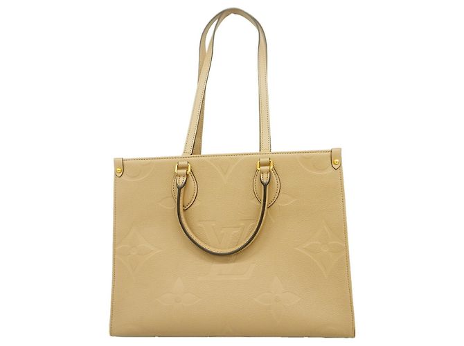 Saco Tote Louis Vuitton Monogram Empreinte OnTheGo MM Cinza