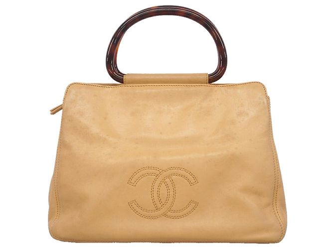 Bolso de mano Chanel en piel de cordero beige