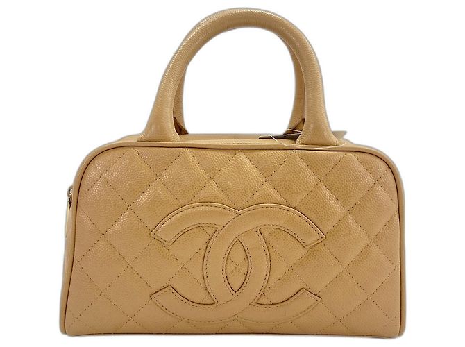 Mini borsa CHANEL Matelassé in Beige