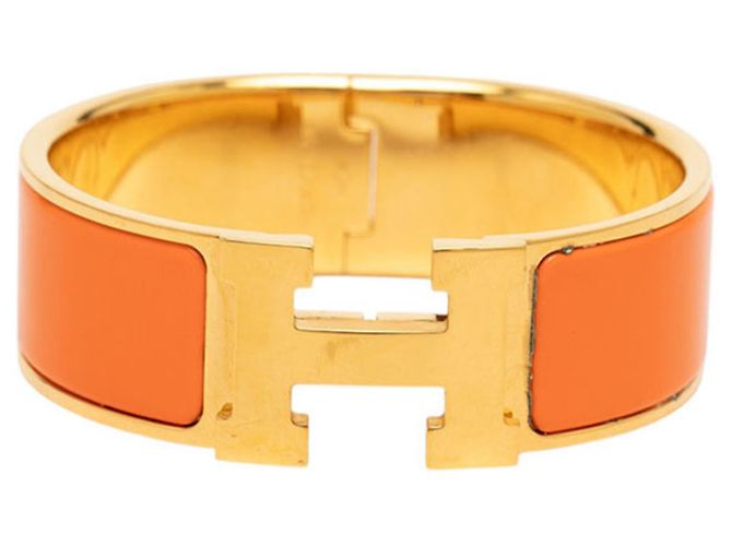 Hermès Pulsera Hermes Clic Clac H PM en Oro Naranja Dorado