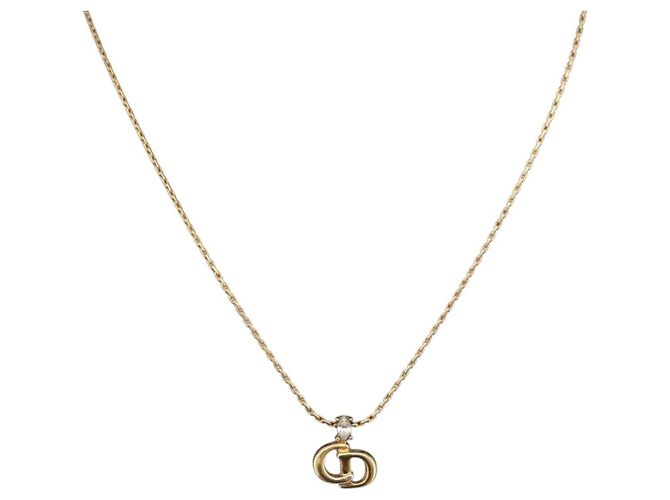 Pendente Christian Dior CD in metallo e cristalli D'oro