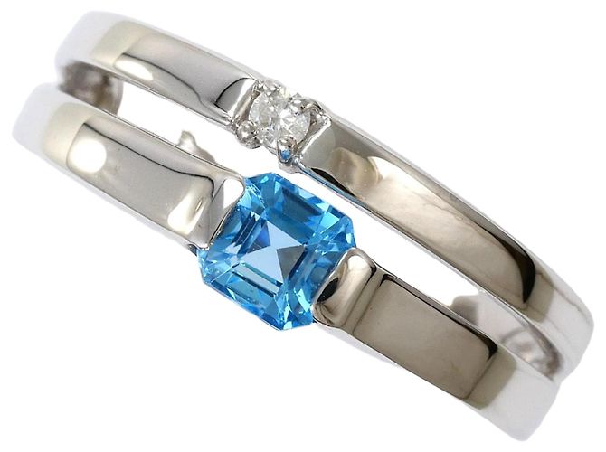 Autre Marque Anel aliança em ouro branco com topázio azul e diamante Dourado