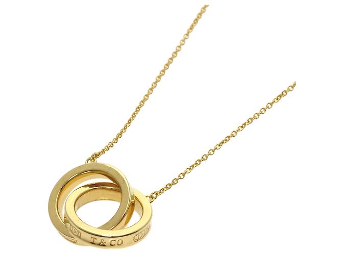 Collana Interlocking di Tiffany & Co. in oro giallo 18K