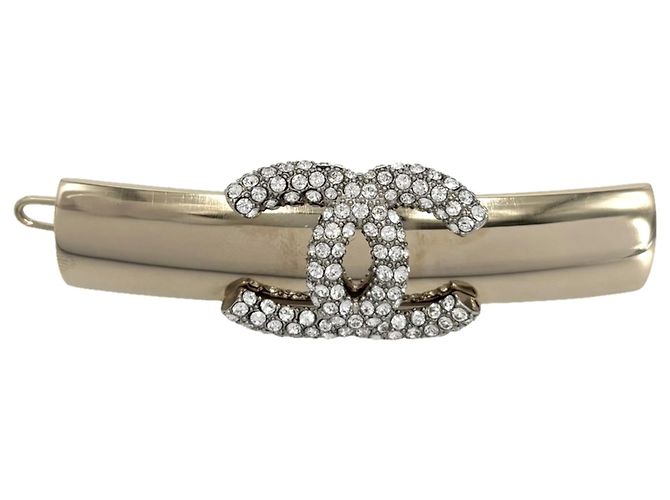 Fermi capelli Chanel strass dorato D'oro