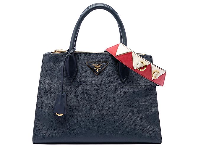 Bolsa Prada Blue City em Saffiano com acabamentos em couro de bezerro Greche Paradigme Azul Azul marinho