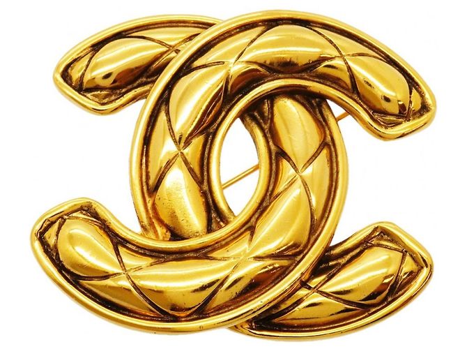 Broche Chanel plaquée or Doré