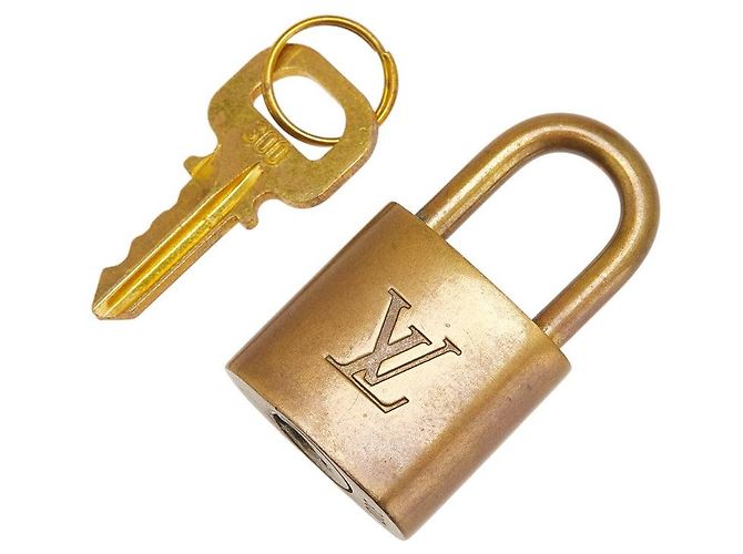 Accessorio Lucchetto Louis Vuitton D'oro Metallico
