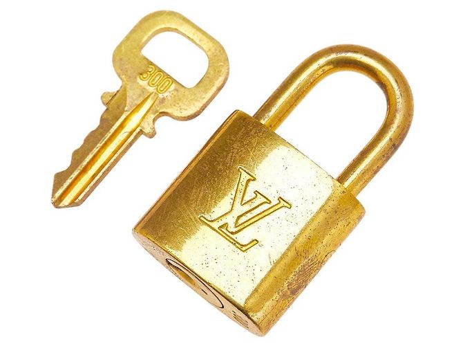 Louis Vuitton Vorhängeschloss und Schlüssel Set Accessoire Golden Metallisch