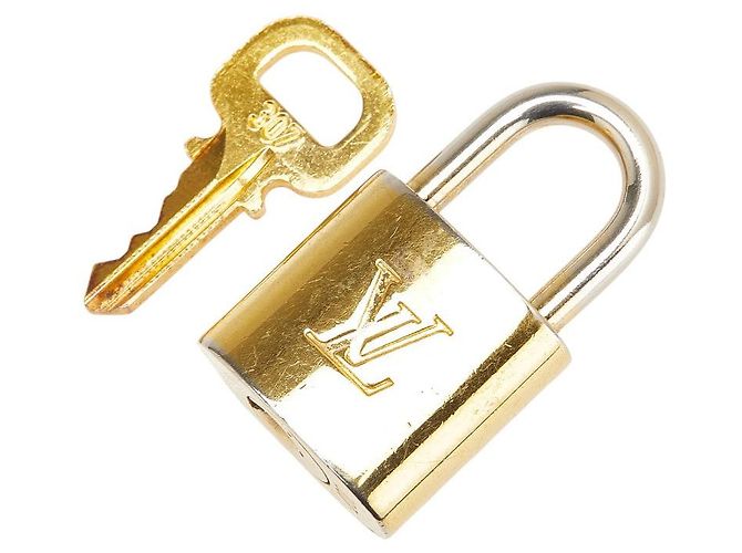 Accessorio Lucchetto Louis Vuitton D'oro Metallico