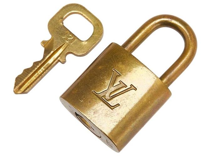 Accessorio Set Chiave e Lucchetto Louis Vuitton D'oro Metallico