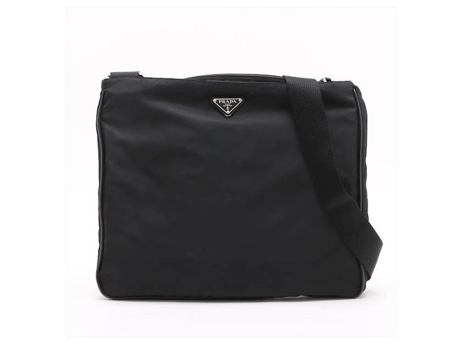 Sac messager Prada en nylon Tessuto avec logo triangle en cuir Noir
