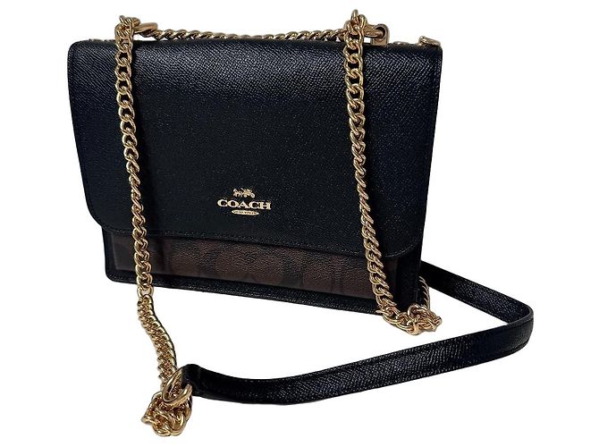 Borsa a tracolla Coach in pelle nera e monogramma marrone Nero