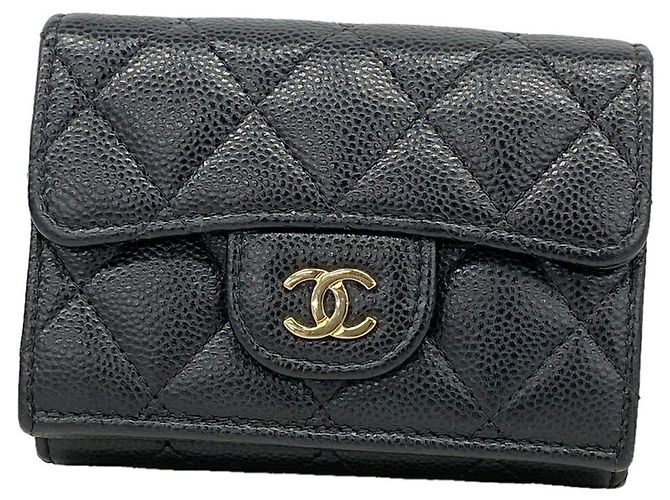 Cartera tri-fold de Chanel en negro