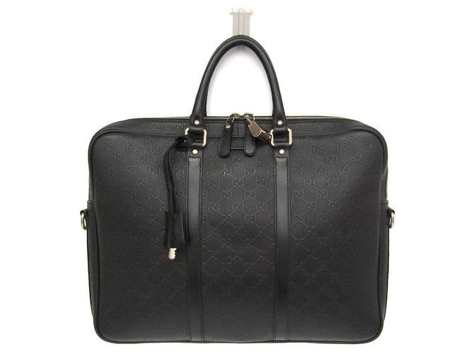 Borsetta in pelle da uomo Gucci GG embossed Nero