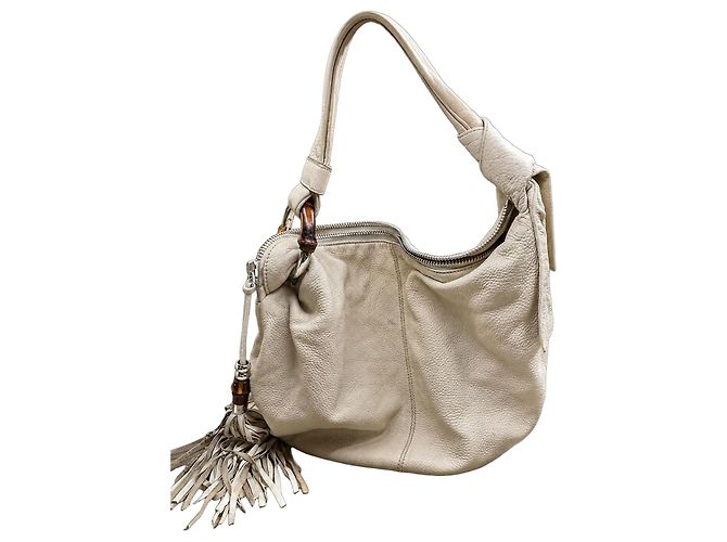 Gucci Bolso de mano de cuero blanco con flecos y detalles de bambú