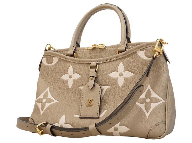 Bolsa Louis Vuitton Monogram Empreinte Trianon PM Bege