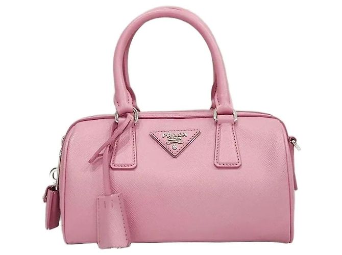 Prada Bolsa crossbody com alça de mão em couro Saffiano rosa