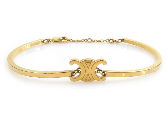 Céline Pulsera de Metal Dorado Celine Triomphe
