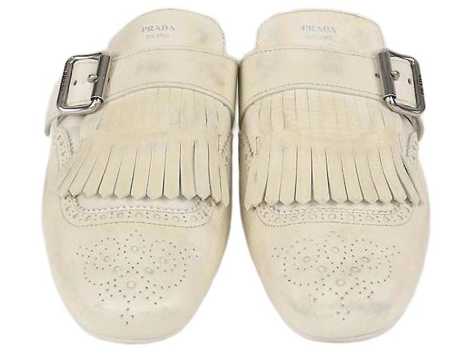 Mules Shuffle de piel Off White con flecos Prada Blanco