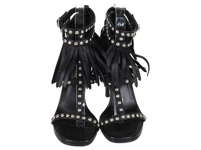 Sandali T-Strap Saint Laurent in pelle nera con borchie e frange Nero