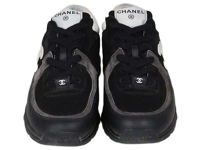 Baskets basses Chanel en mesh et cuir CC Noir/Blanc