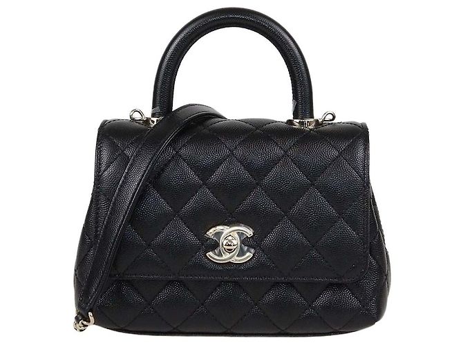 Mini borsa Chanel Coco Top Handle in pelle caviar matelassé nera Nero
