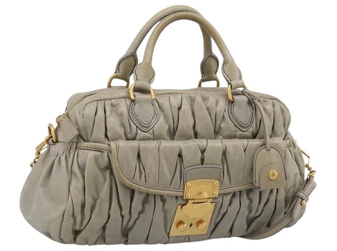 Sac à main Miu Miu Vitellolux en cuir 2way Vert Doré Auth 202078V