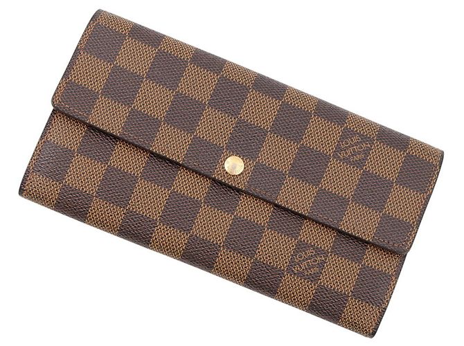 Portamonete Louis Vuitton Damier Ebene Marrone