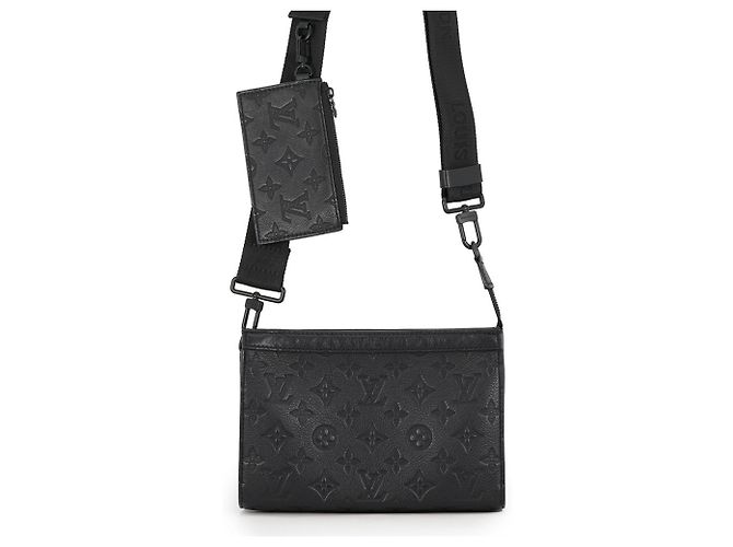 Portefeuille porté Louis Vuitton Monogram Shadow Gaston Noir Monogramme