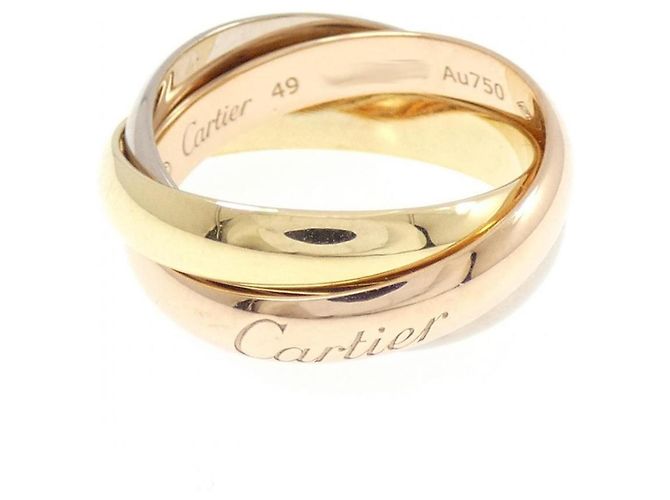 Anello Cartier Trinity in oro rosa bianco e giallo 18K
