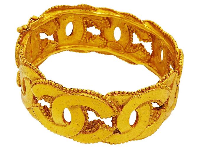 Bangles Chanel placcato oro D'oro