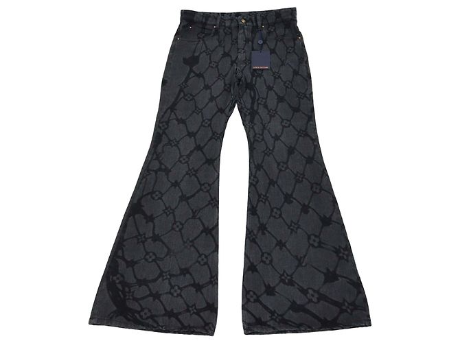 Calças flare Louis Vuitton em denim preto Monogram e rede