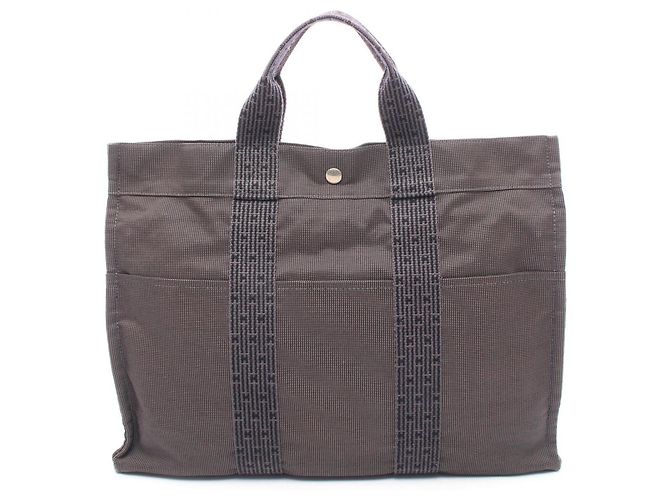 Hermès Saco Tote Hermes Herline MM Marrom