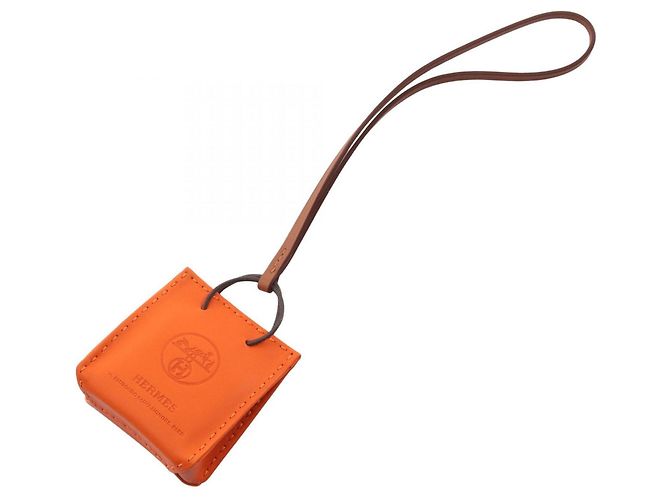 Hermès Accessorio Charm per Borsa Orange Feu Gold Marrone Arancione