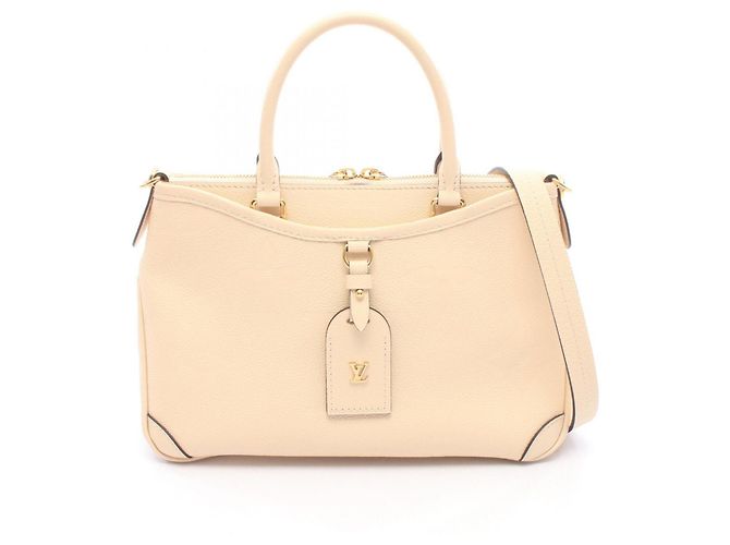 Bolsa Louis Vuitton Trianon PM Monogram Empreinte Bege Cru