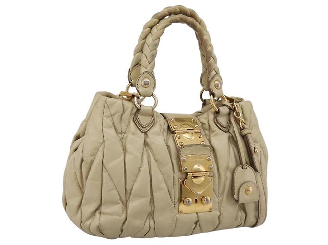 Bolsa de Mão Miu Miu em Couro 2way Bege Tom Dourado Auth 167578A