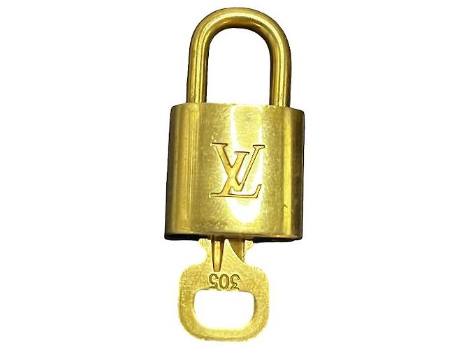 Louis Vuitton Cadeado e Chave Logo Metal medium Dourado