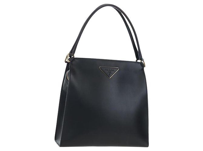 Bolsa de ombro PRADA em couro preto e dourado