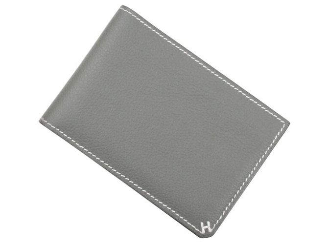 Hermès Cartera bi-fold Hermes en cuero gris Castaño