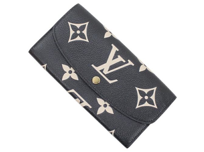 Portafoglio bi-fold Louis Vuitton Monogram Empreinte Giant Nero Beige Monogramma
