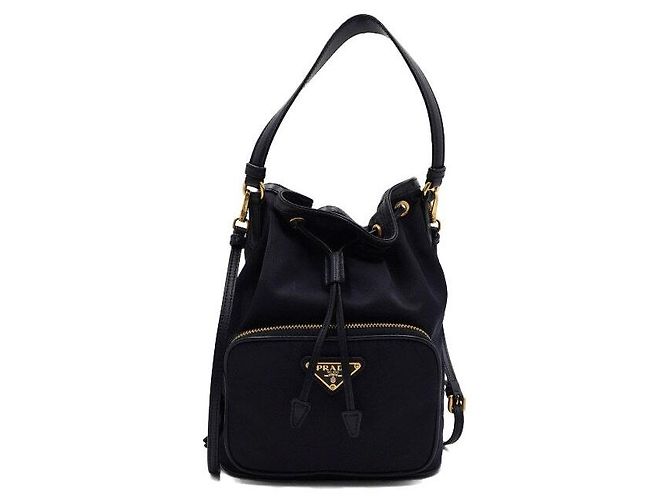 Tote Prada Borsa a secchiello e borsa a tracolla Bella in tessuto blu navy con metallo dorato